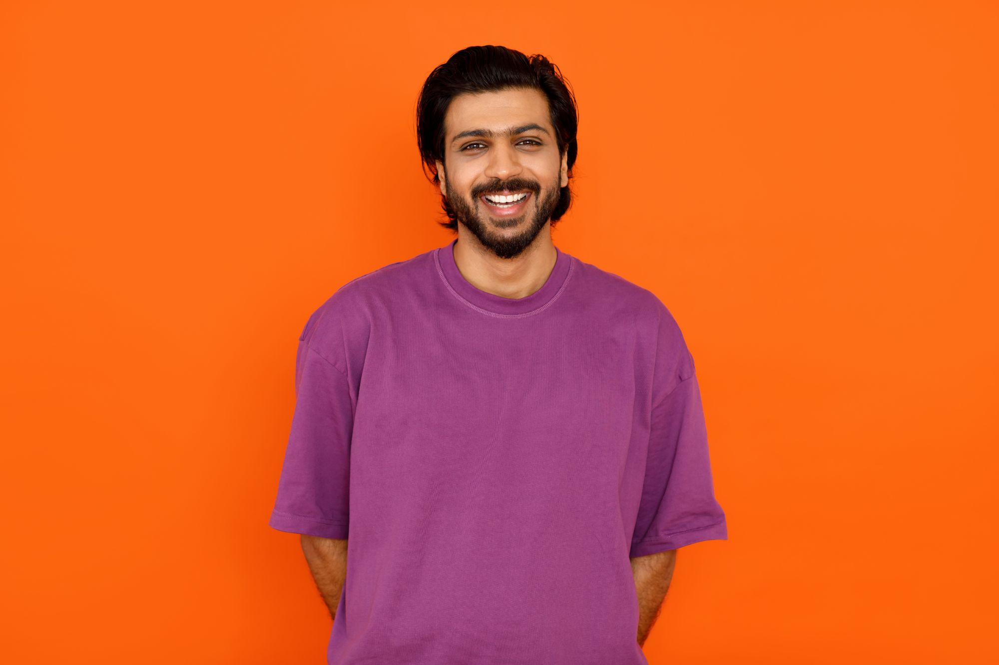 handsome cheerful indian guy in casual posing on o 78w9fn2.jpg